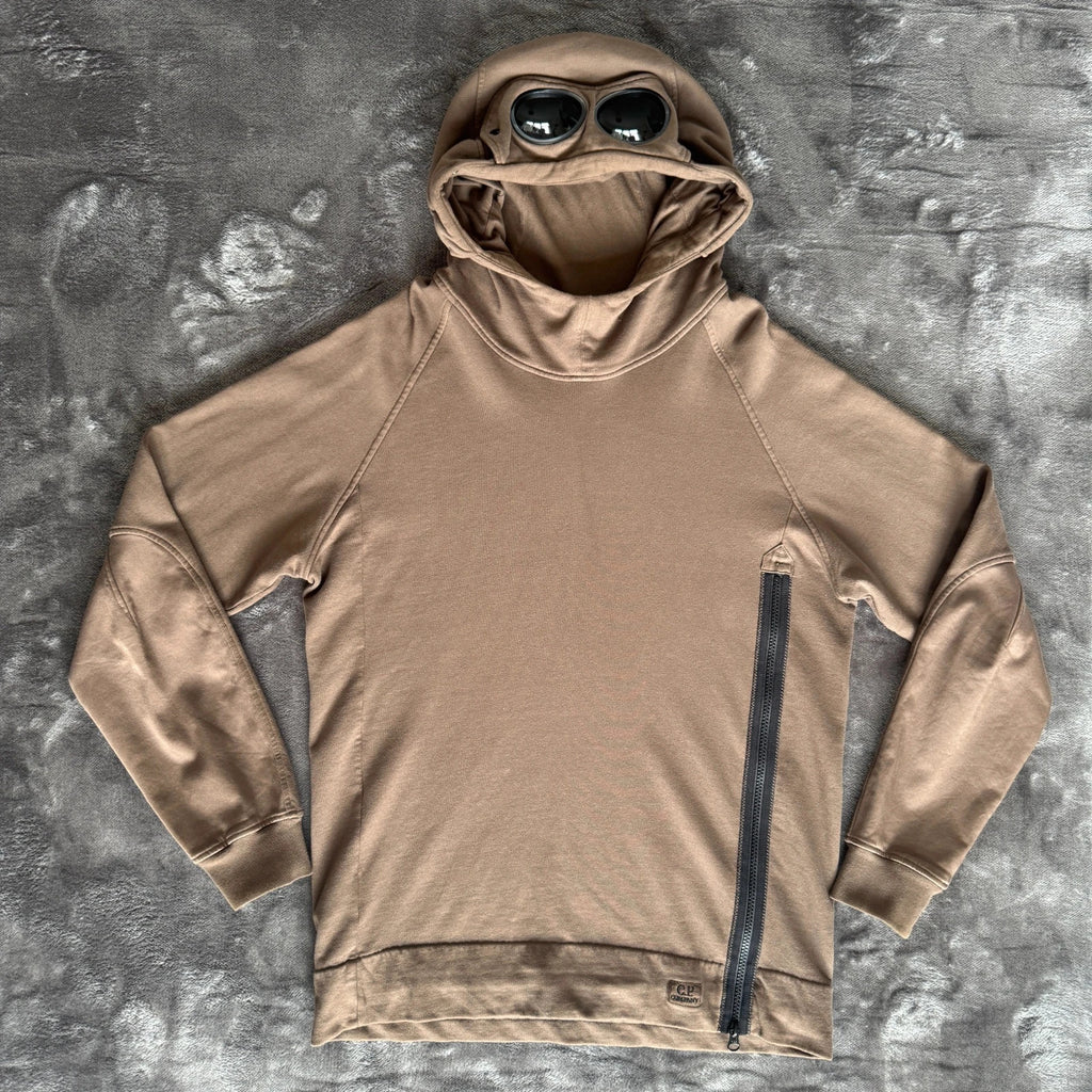 C.P. Company khaki goggle hoodie with side zip and logo detail.