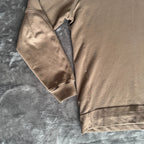C.P. Company khaki goggle hoodie with side zip and logo detail.