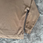 C.P. Company khaki goggle hoodie with side zip and logo detail.