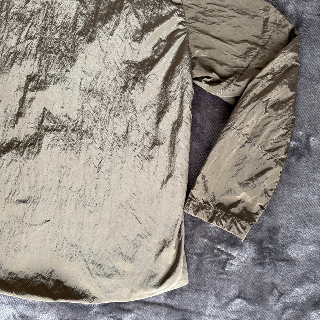 Stone Island khaki overshirt with logo patch and nylon metal cotton blend material.
