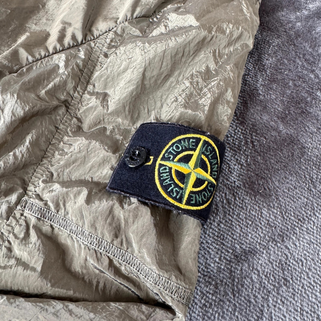 Stone Island khaki overshirt with logo patch and nylon metal cotton blend material.