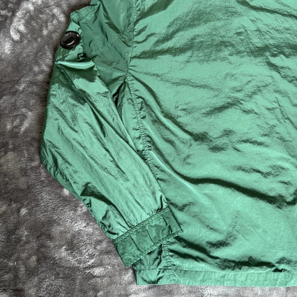 C.P. Company green overshirt with Chrome-R pocket and lens detail, brand new condition.