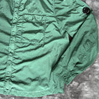 C.P. Company green overshirt with Chrome-R pocket and lens detail, brand new condition.