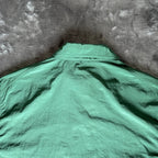 C.P. Company green overshirt with Chrome-R pocket and lens detail, brand new condition.