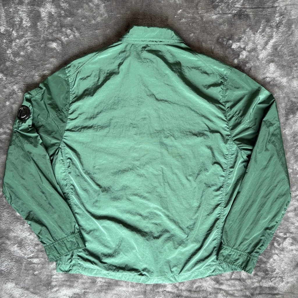 C.P. Company green overshirt with Chrome-R pocket and lens detail, brand new condition.