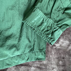C.P. Company green overshirt with Chrome-R pocket and lens detail, brand new condition.