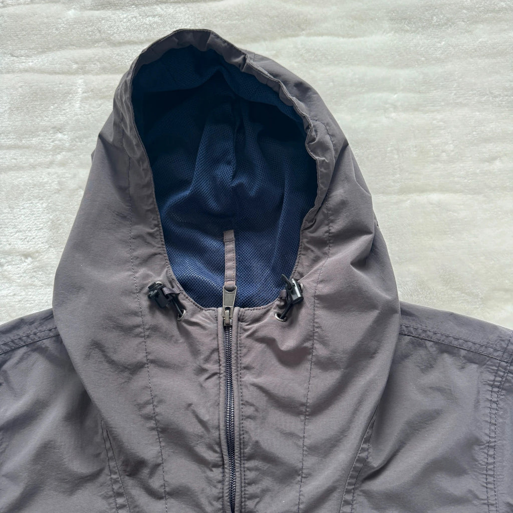 Napapijri grey pullover jacket with logo patch and ventilation zips, lightweight anorak design.