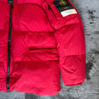 Stone Island red puffer jacket with compass patch, adjustable hood, and multiple pockets.