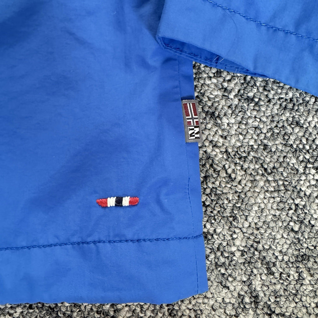Napapijri blue anorak jacket with logo chest flap and quarter-zip front closure.